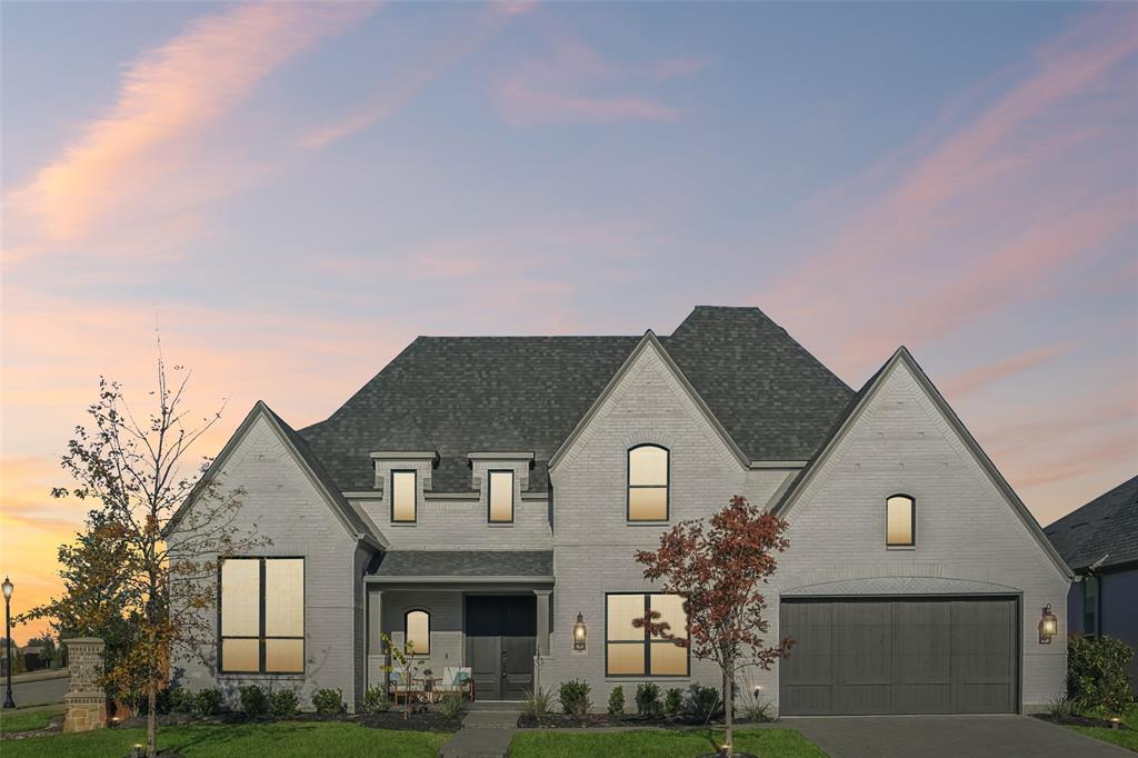 2800 Count Fleet Way Celina, TX 75009 - Photo 4 of 34 a front view of a house with garden