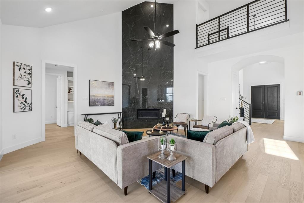 2800 Count Fleet Way Celina, TX 75009 - Photo 9 of 34 a living room with furniture and a flat screen tv