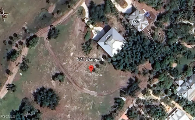 an aerial view of beach and outdoor space