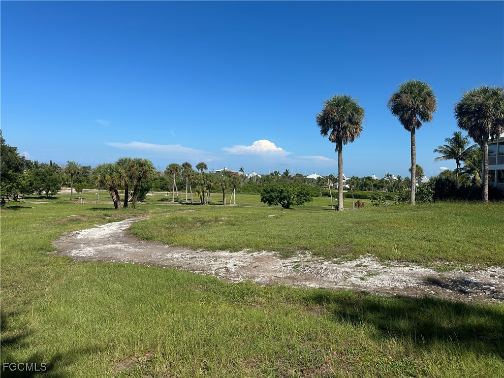 327 Useppa Island Bokeelia, FL 33922 - Photo 11 of 13 a view of a garden with a lake