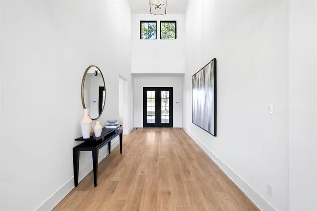 a view of entryway with wooden floor