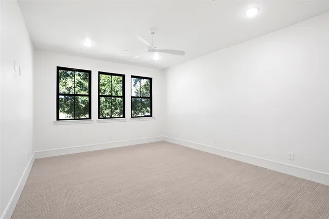 a bathroom with a toilet sink and shower