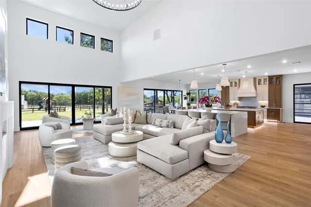 a living room with furniture and a table