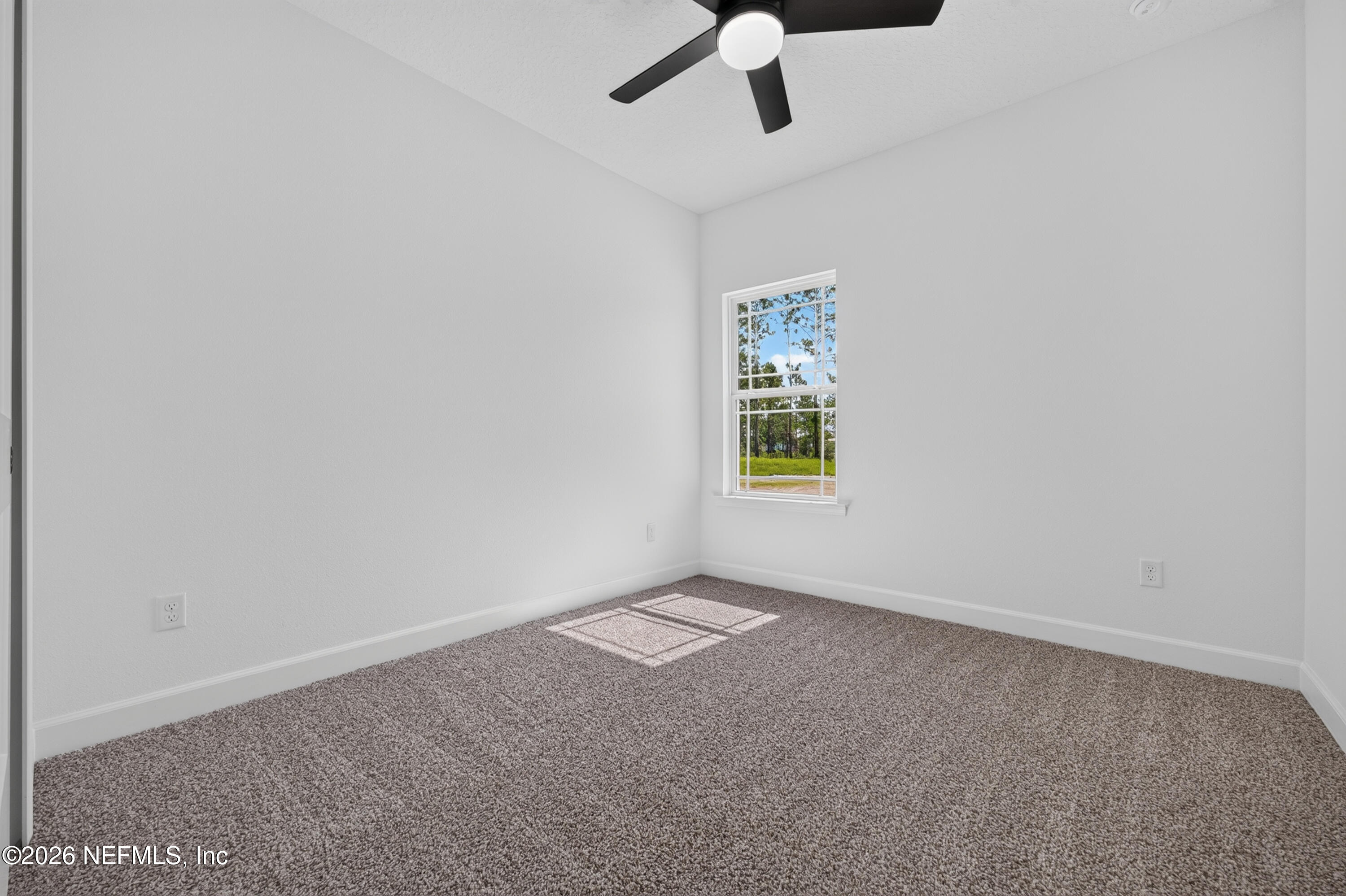 4362 Angora Street Middleburg, FL 32068 - Photo 18 of 31 an empty room with a window