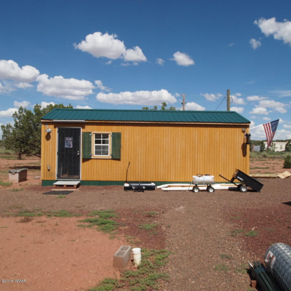 4214 Indian Bend Road Snowflake, AZ 85937 - Photo 34 of 43 a view of a house with backyard and sitting area