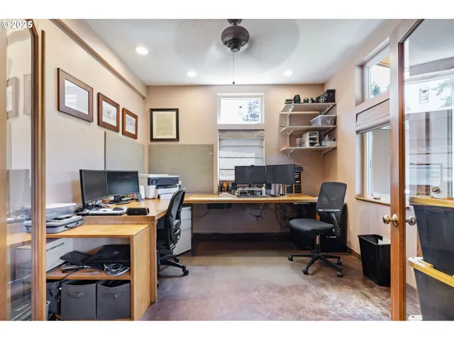a workspace with furniture and a window