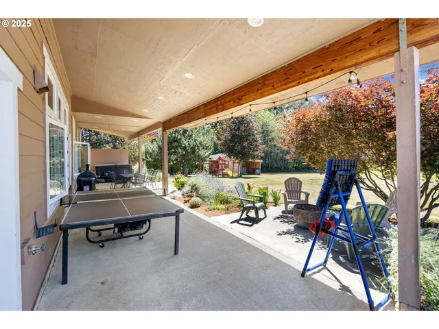 a room with furniture and a large window
