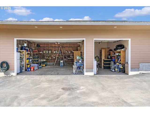 a view of a garage with a table and a chair