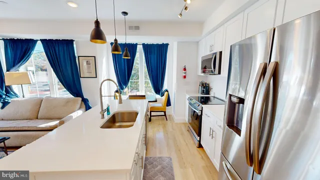 a living room with furniture and a table