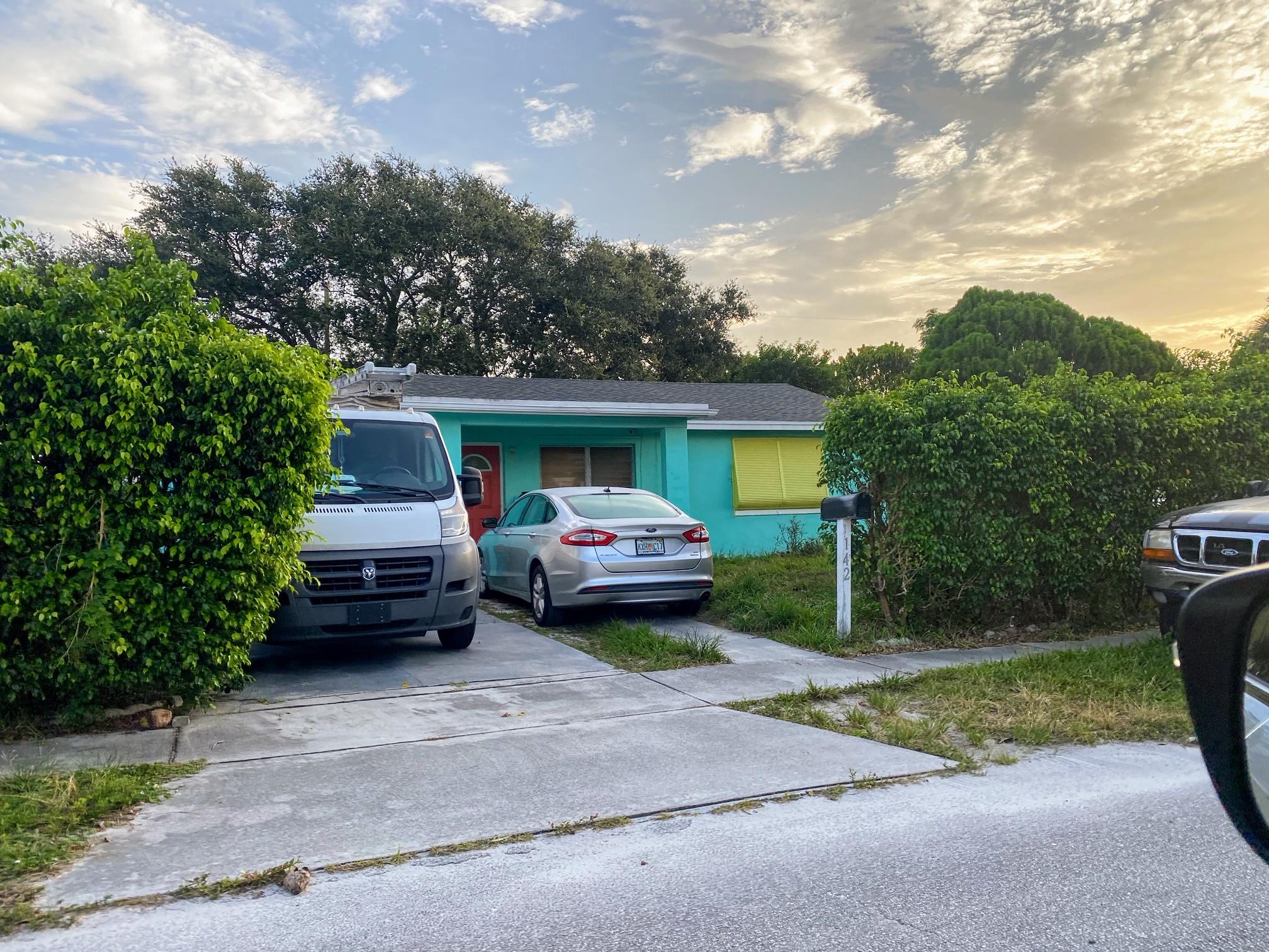 142 West 34th Street Riviera Beach, FL 33404 - Photo 1 of 8 front