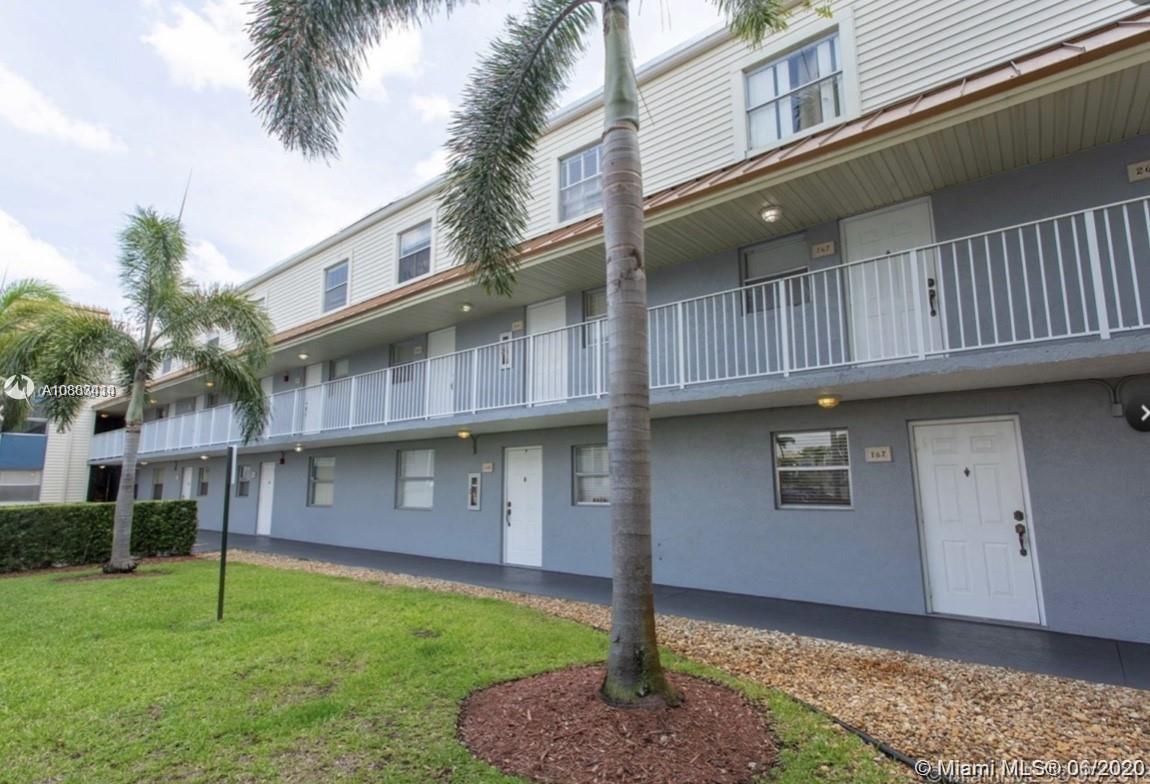 Glenvar Heights Miami, FL 33155 - Photo 2 of 12 a front view of a house with garden