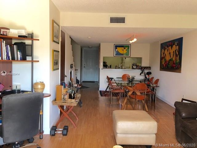 Glenvar Heights Miami, FL 33155 - Photo 4 of 12 a living room with furniture and wooden floor