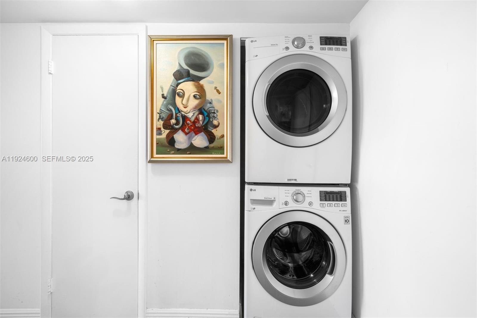 4000 Towerside Terrace, Unit 705 Miami, FL 33138 - Photo 27 of 42 a utility room with dryer and washer