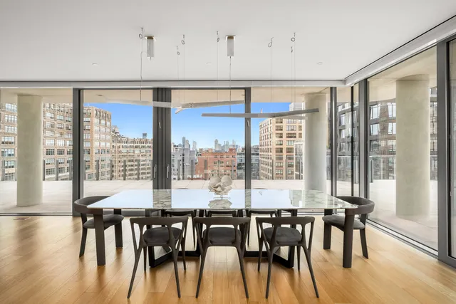a table and chairs in a balcony