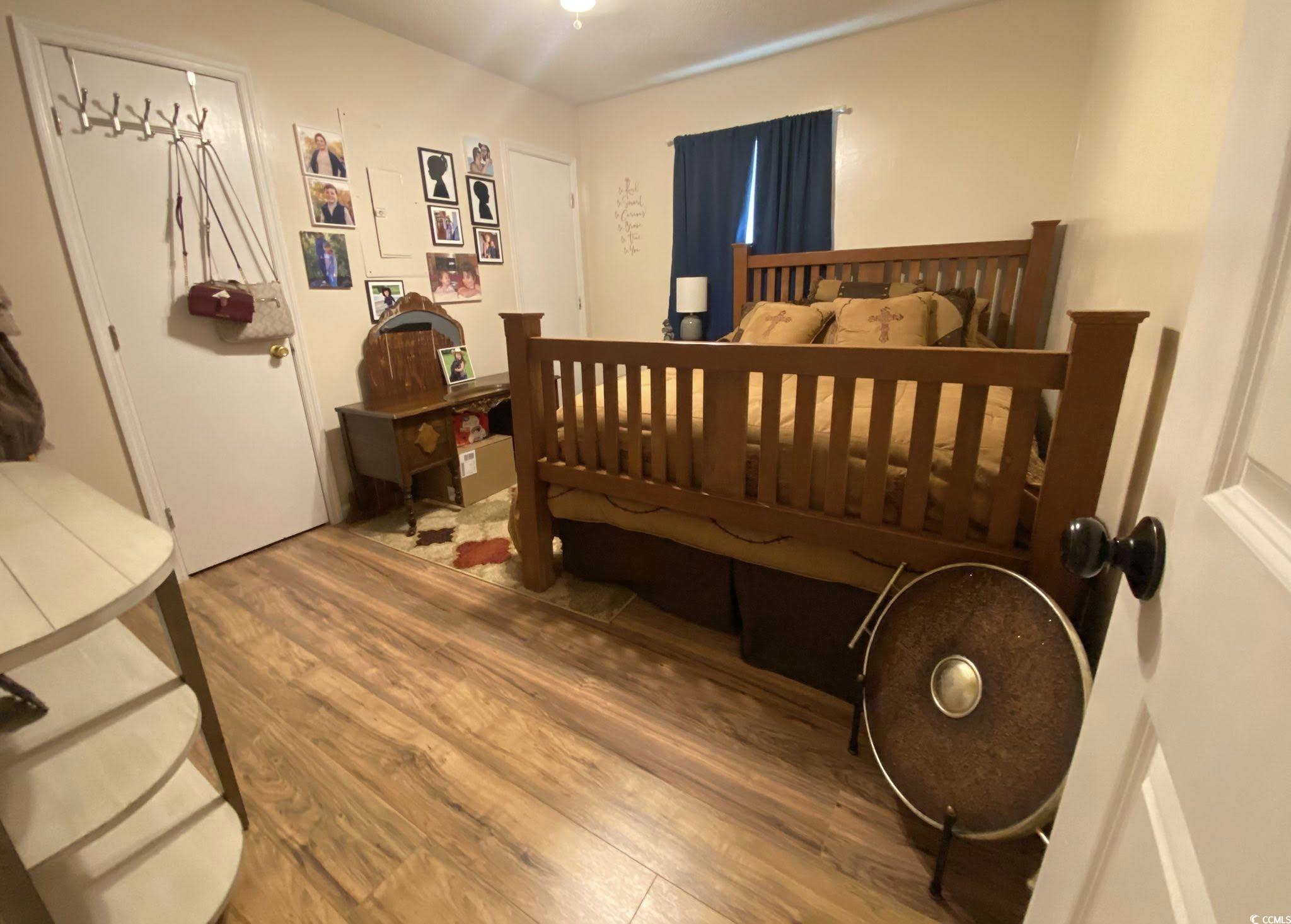 512 South Hazel Avenue Andrews, SC 29510 - Photo 11 of 15 Bedroom featuring wood finished floors