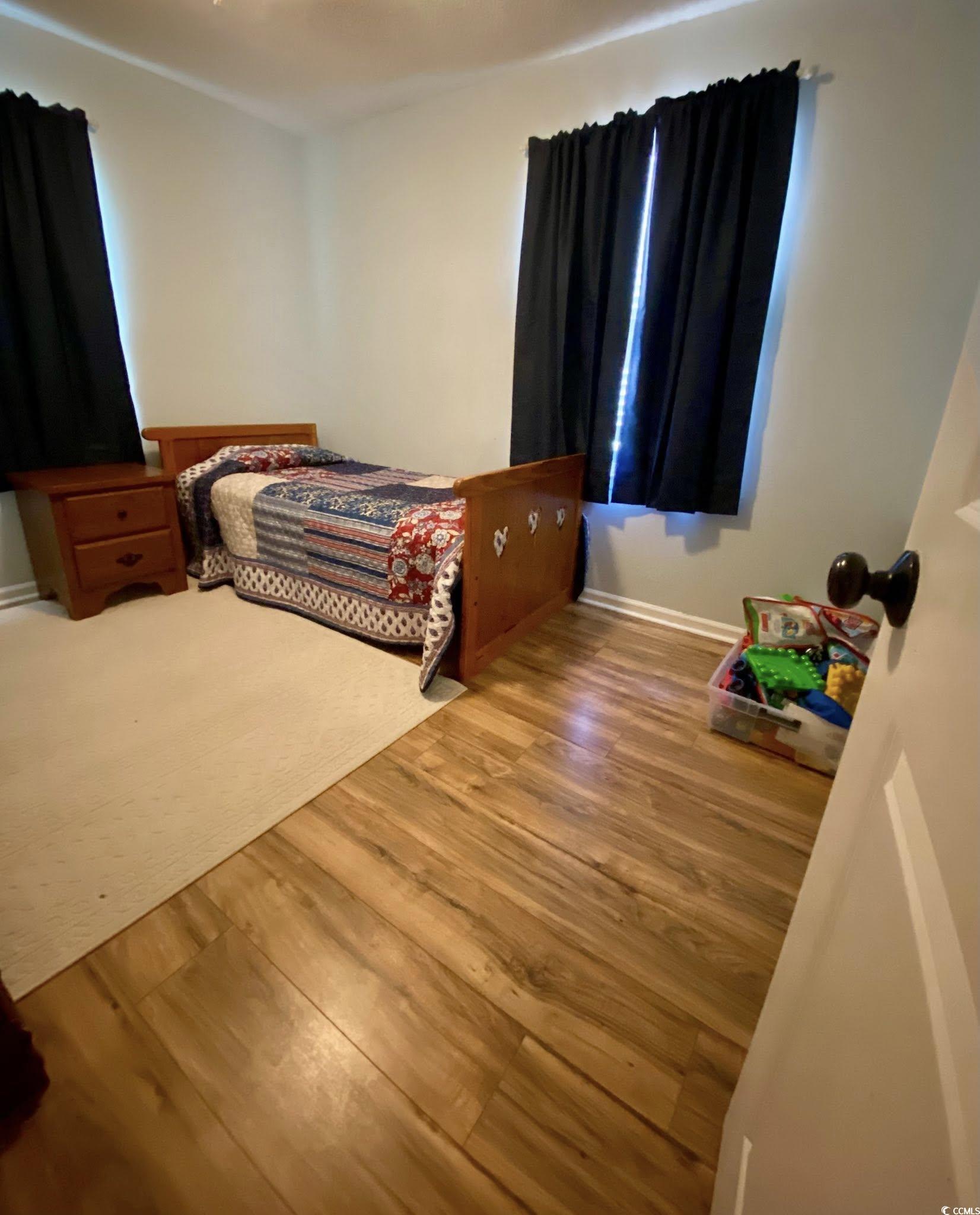 512 South Hazel Avenue Andrews, SC 29510 - Photo 14 of 15 Bedroom with wood finished floors