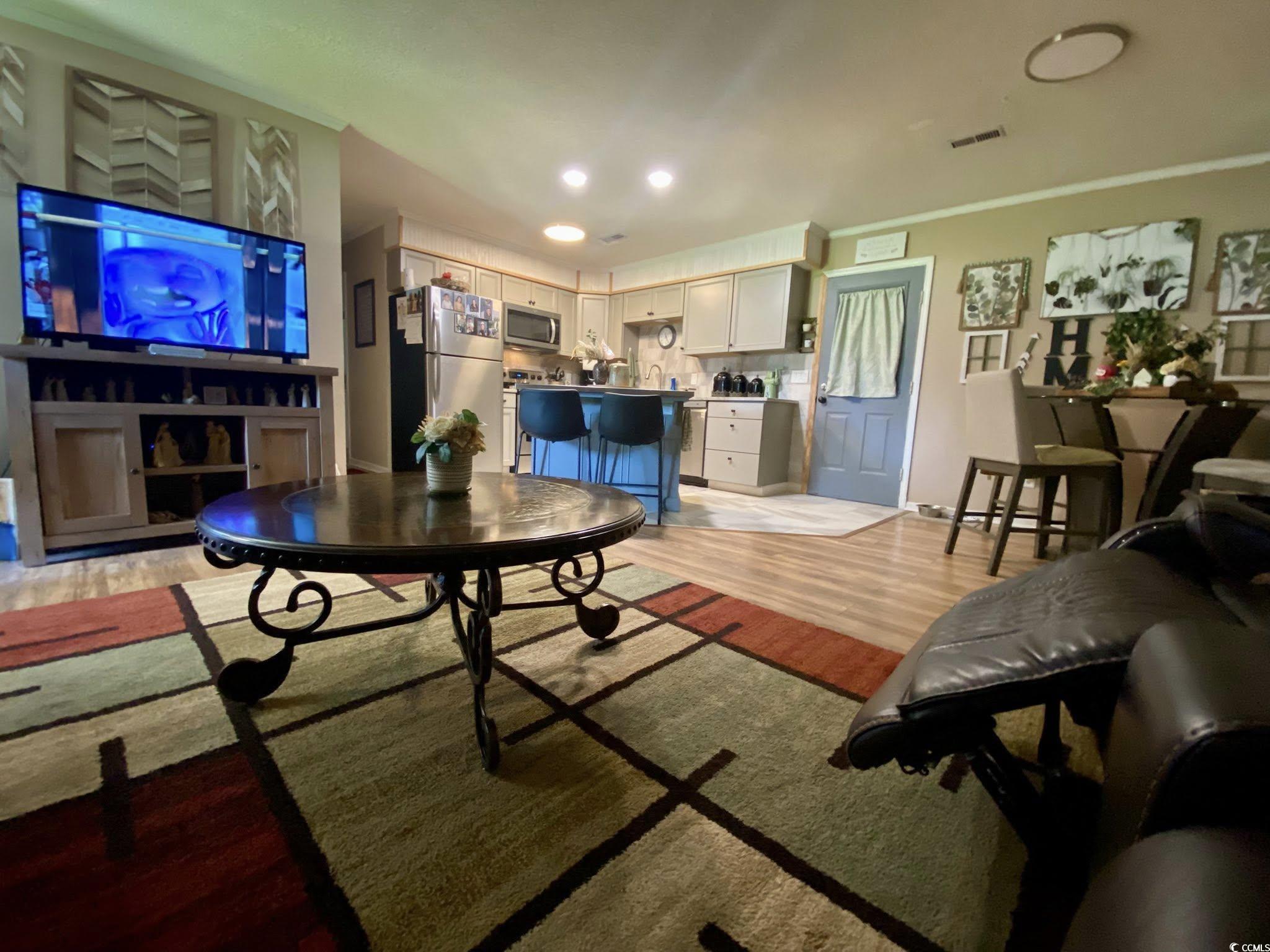 512 South Hazel Avenue Andrews, SC 29510 - Photo 4 of 15 Living room featuring light wood-type flooring and