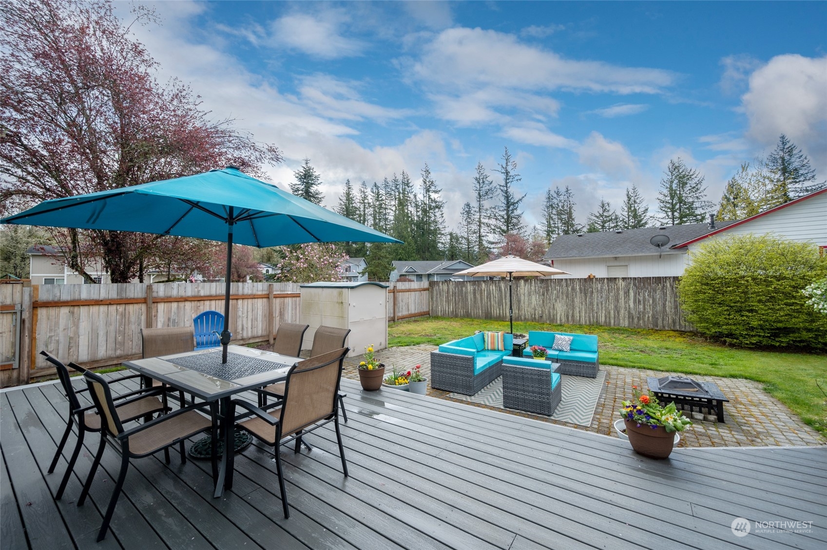 1703 Gohr Road Sultan, WA 98294 - Photo 14 of 16 an outdoor space with furniture and umbrella