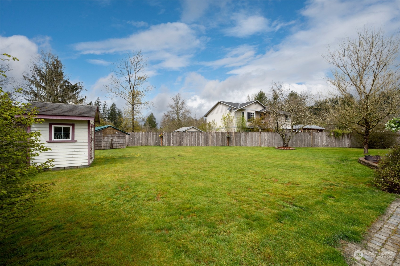 1703 Gohr Road Sultan, WA 98294 - Photo 16 of 16 a view of a house with a yard