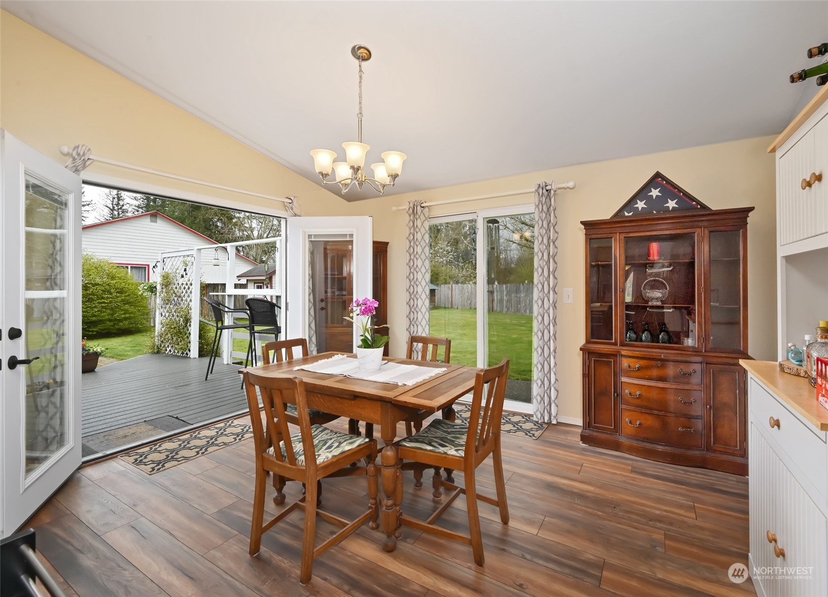1703 Gohr Road Sultan, WA 98294 - Photo 4 of 16 a view of a dining room with furniture window and wooden floor