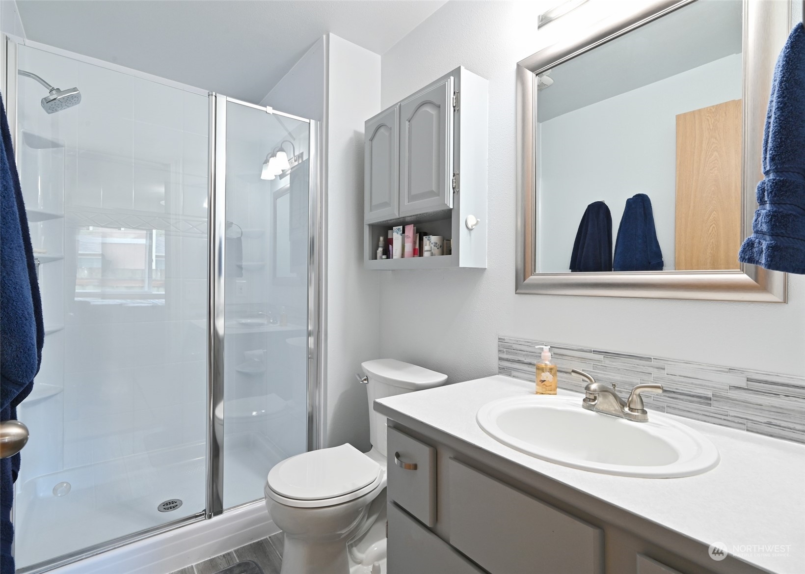1703 Gohr Road Sultan, WA 98294 - Photo 7 of 16 a bathroom with a sink toilet and shower