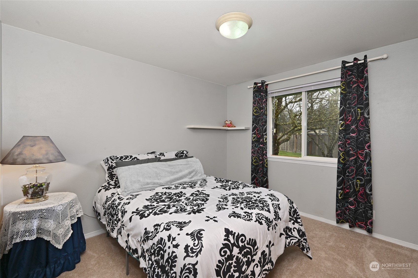 1703 Gohr Road Sultan, WA 98294 - Photo 8 of 16 a bedroom with a bed and a window