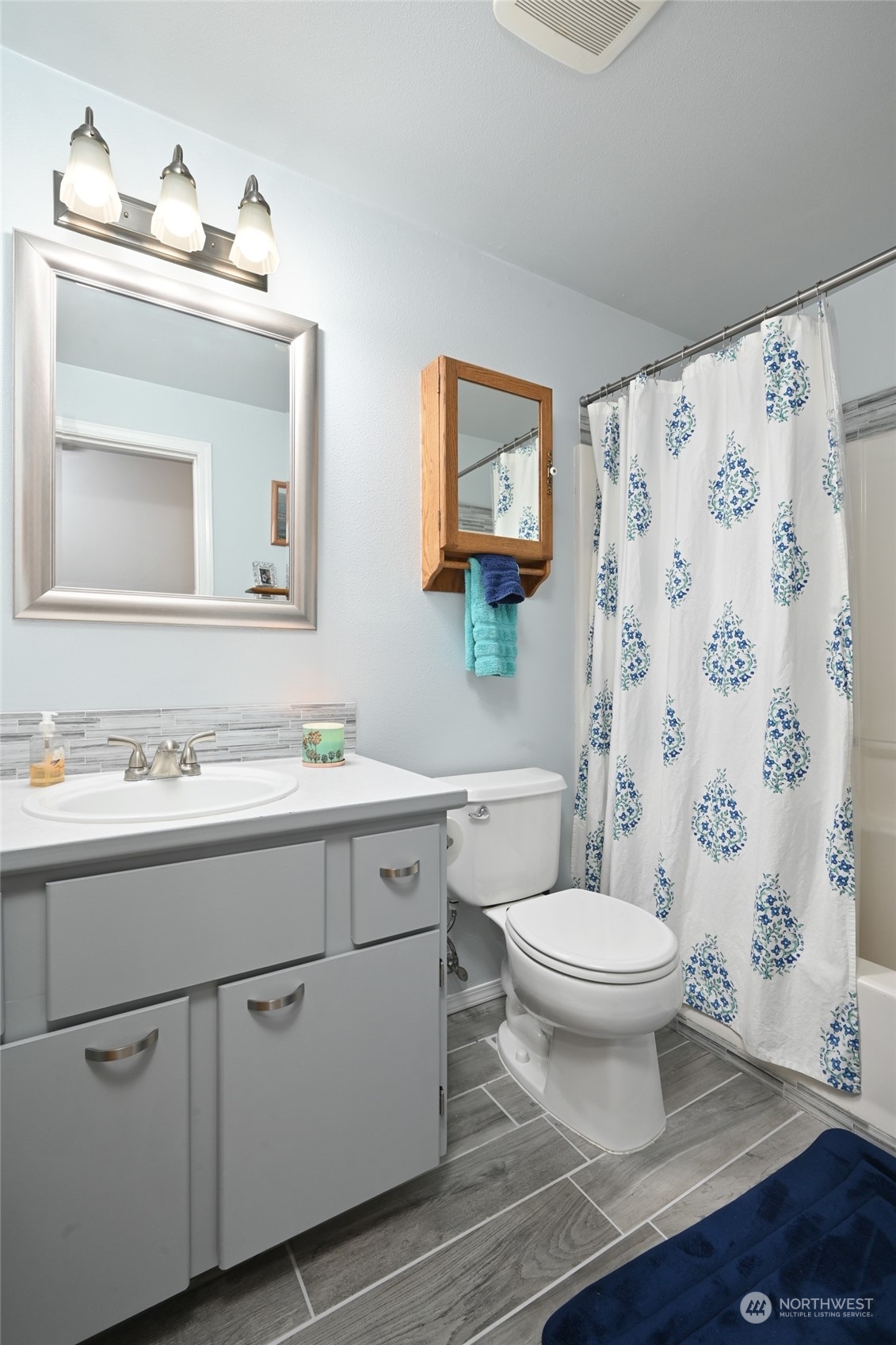 1703 Gohr Road Sultan, WA 98294 - Photo 9 of 16 a bathroom with a sink toilet and mirror