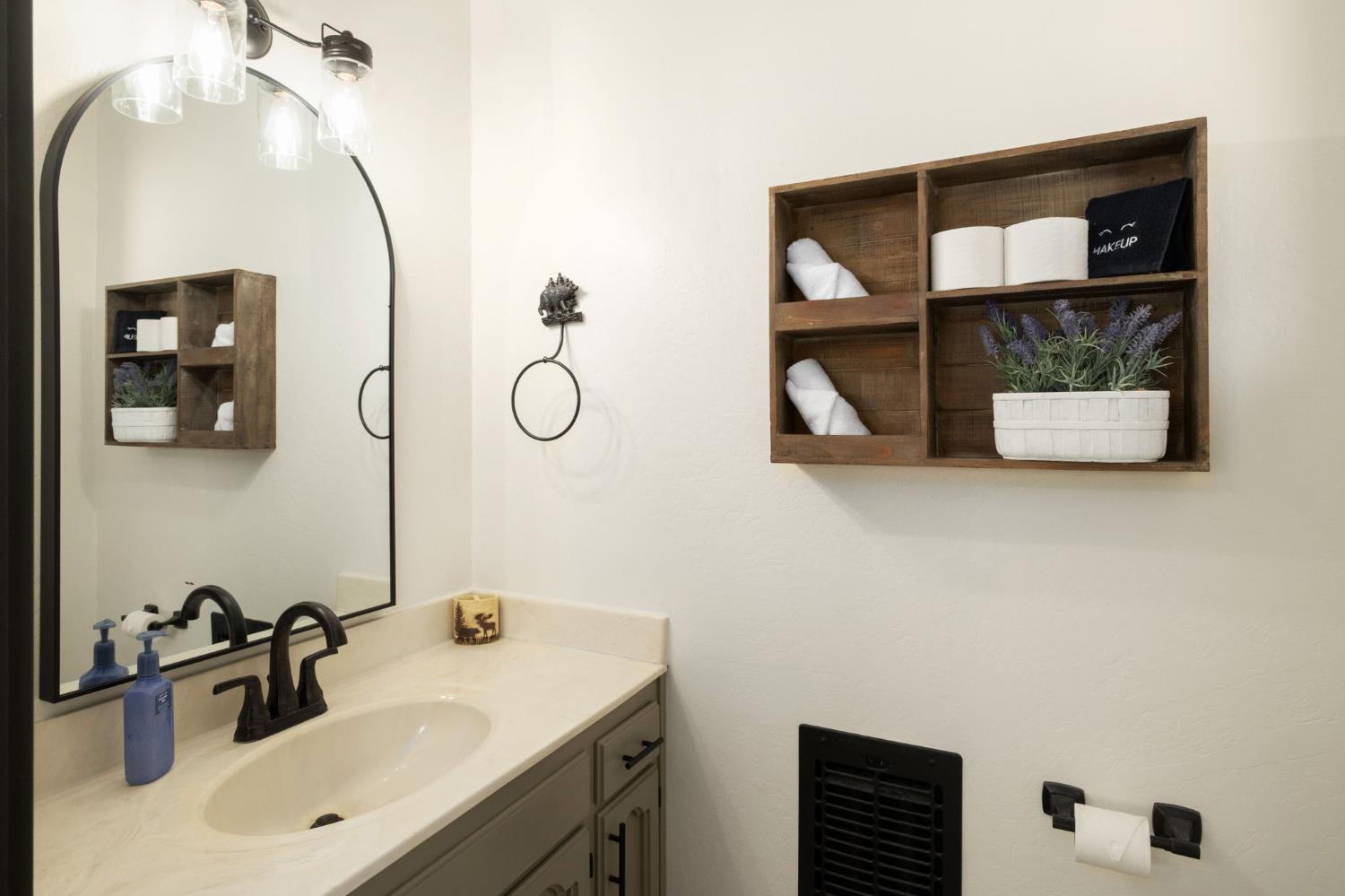 42488 Rock Ledge Road Shaver Lake, CA 93664 - Photo 20 of 26 a bathroom with a sink and mirror
