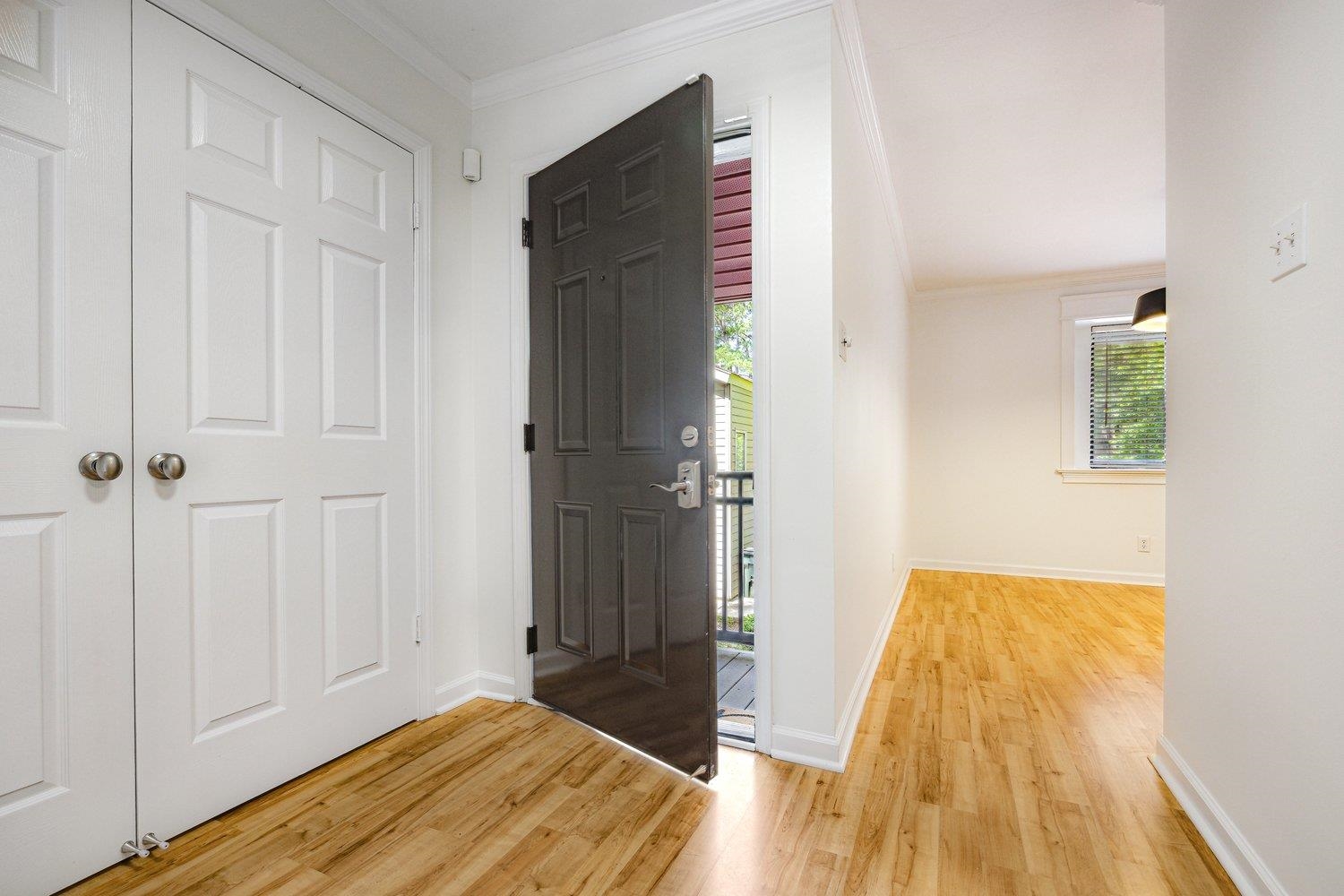 1847 Gray Ridge Cove, Unit 2 Germantown, TN 38138 - Photo 2 of 24 Foyer with light wood finished floors, ornamental molding, and baseboards