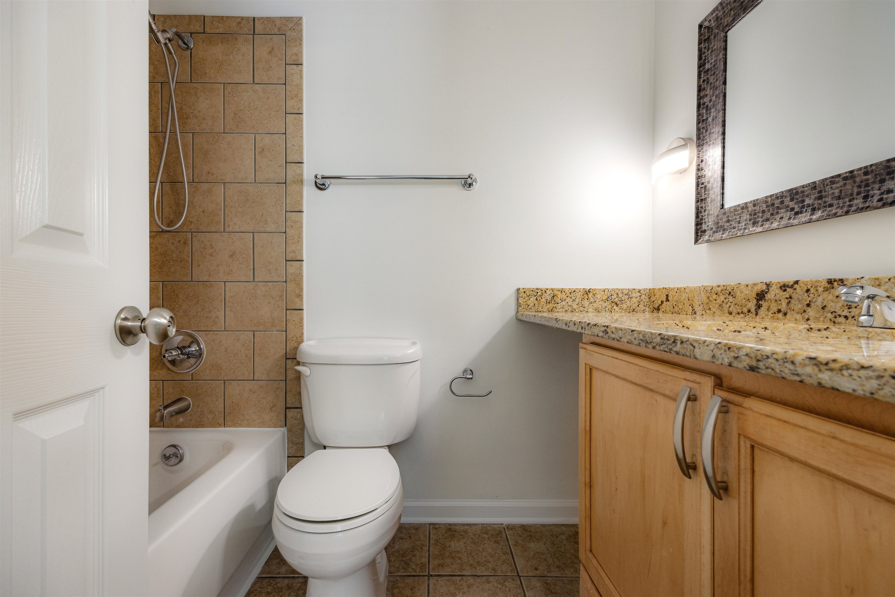 1847 Gray Ridge Cove, Unit 2 Germantown, TN 38138 - Photo 22 of 26 Bathroom featuring vanity, tile patterned floors, toilet, tub / shower combination, and baseboards