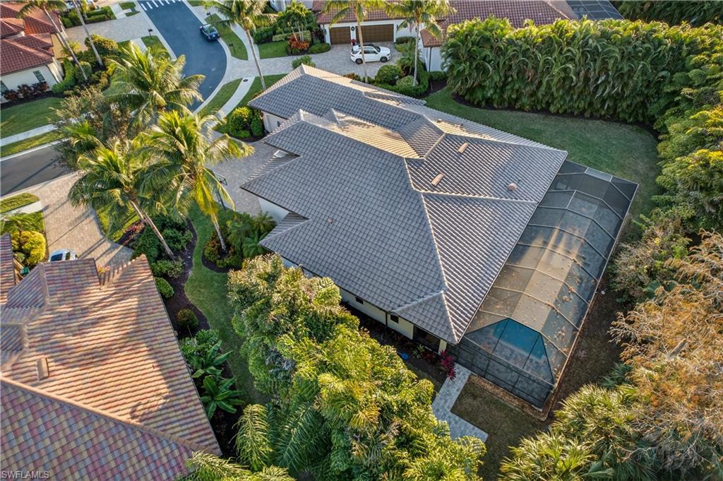 7405 Acorn Way Naples, FL 34119 - Photo 41 of 50 a view of a backyard with plants