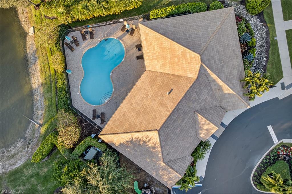 7405 Acorn Way Naples, FL 34119 - Photo 42 of 50 an aerial view of a house having outdoor space