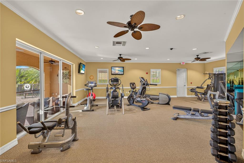 7405 Acorn Way Naples, FL 34119 - Photo 45 of 50 a view of a room with gym equipment