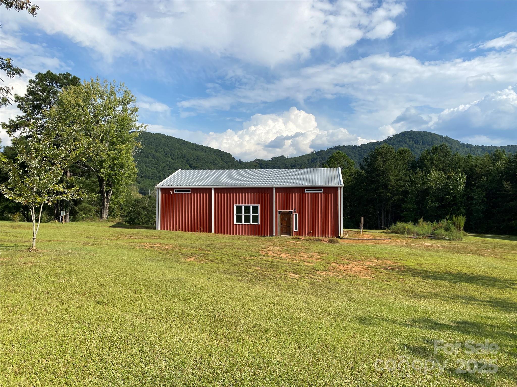 1180 Calton Road Bostic, NC 28018 - Photo 1 of 36 a house view with trees in the background