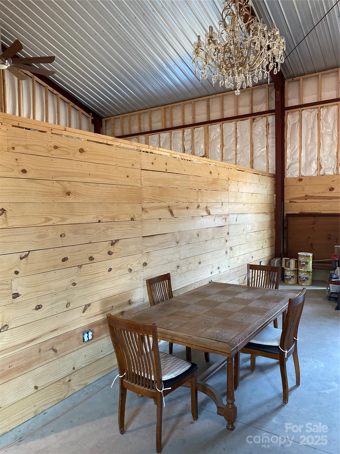 1180 Calton Road Bostic, NC 28018 - Photo 21 of 36 a roof deck with table and chairs with wooden floor