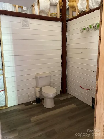 a view of a swimming pool with a yard