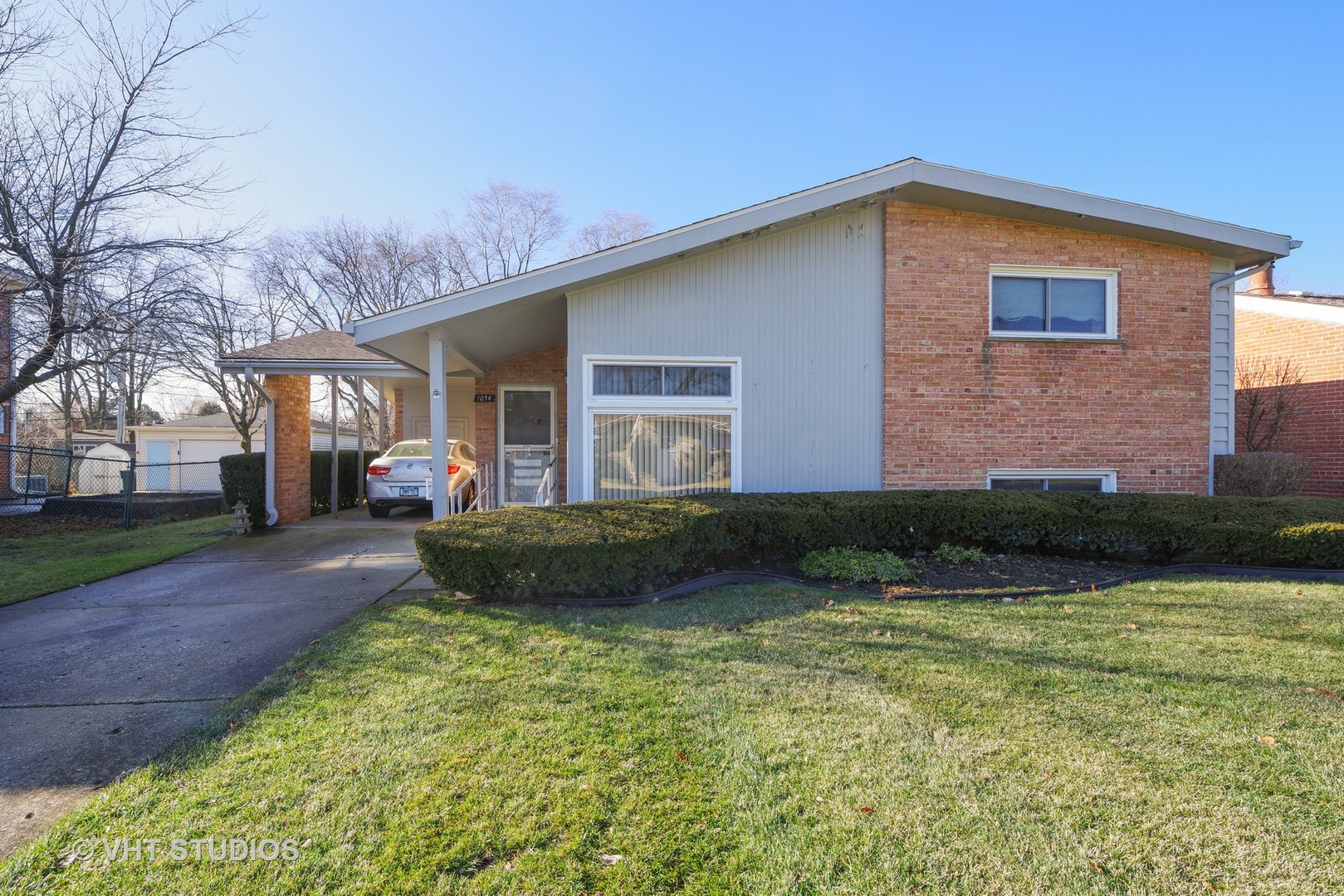 1034 Longaker Road Northbrook, IL 60062 - Photo 1 of 10 a front view of a house with garden