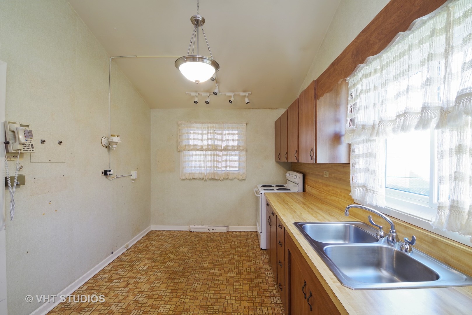 1034 Longaker Road Northbrook, IL 60062 - Photo 3 of 10 a kitchen with a sink and a window