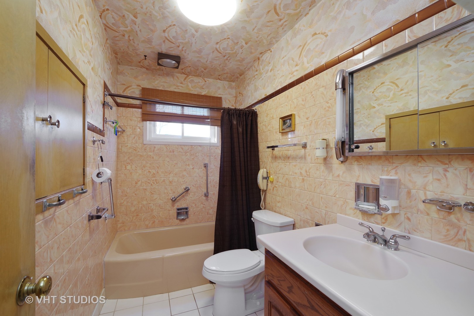 1034 Longaker Road Northbrook, IL 60062 - Photo 7 of 10 a bathroom with a sink toilet and shower