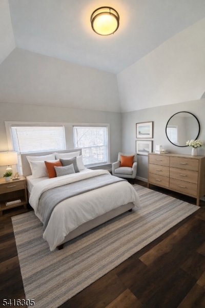 9 Oak Place Irvington, NJ 07111 - Photo 12 of 15 a bedroom with a bed and window