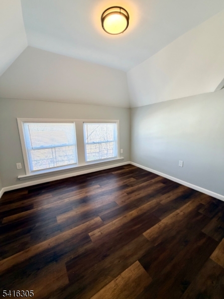 9 Oak Place Irvington, NJ 07111 - Photo 13 of 15 an empty room with wooden floor and windows