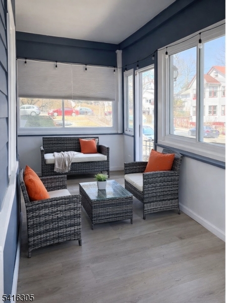 9 Oak Place Irvington, NJ 07111 - Photo 2 of 15 a outdoor living space with patio furniture and a potted plant