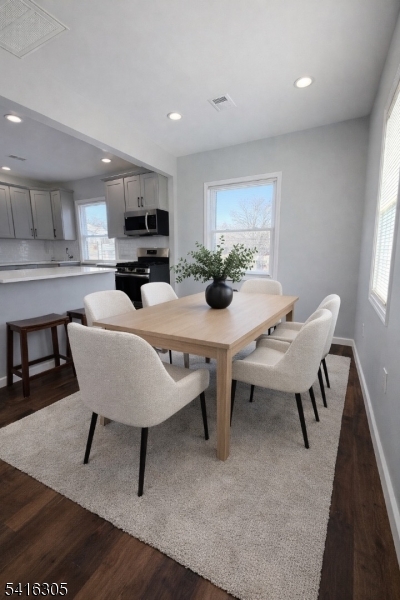 9 Oak Place Irvington, NJ 07111 - Photo 7 of 15 a view of a dining room with furniture