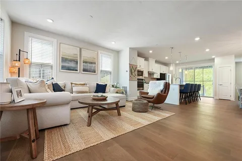 a living room with furniture or couch and a window