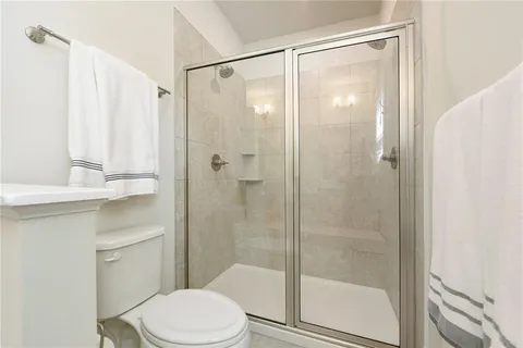 a bathroom with a double vanity sink and mirror
