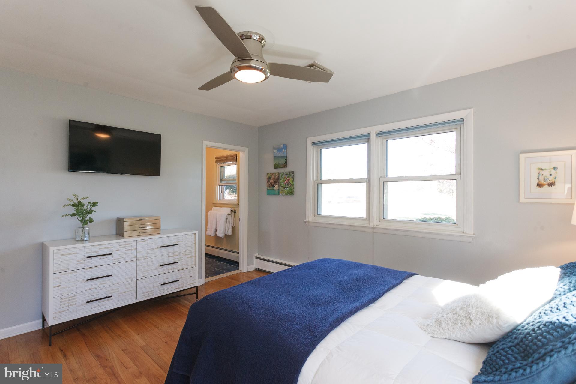 2017 Quarry Road Yardley, PA 19067 - Photo 13 of 37 a bedroom with a bed and a flat screen tv