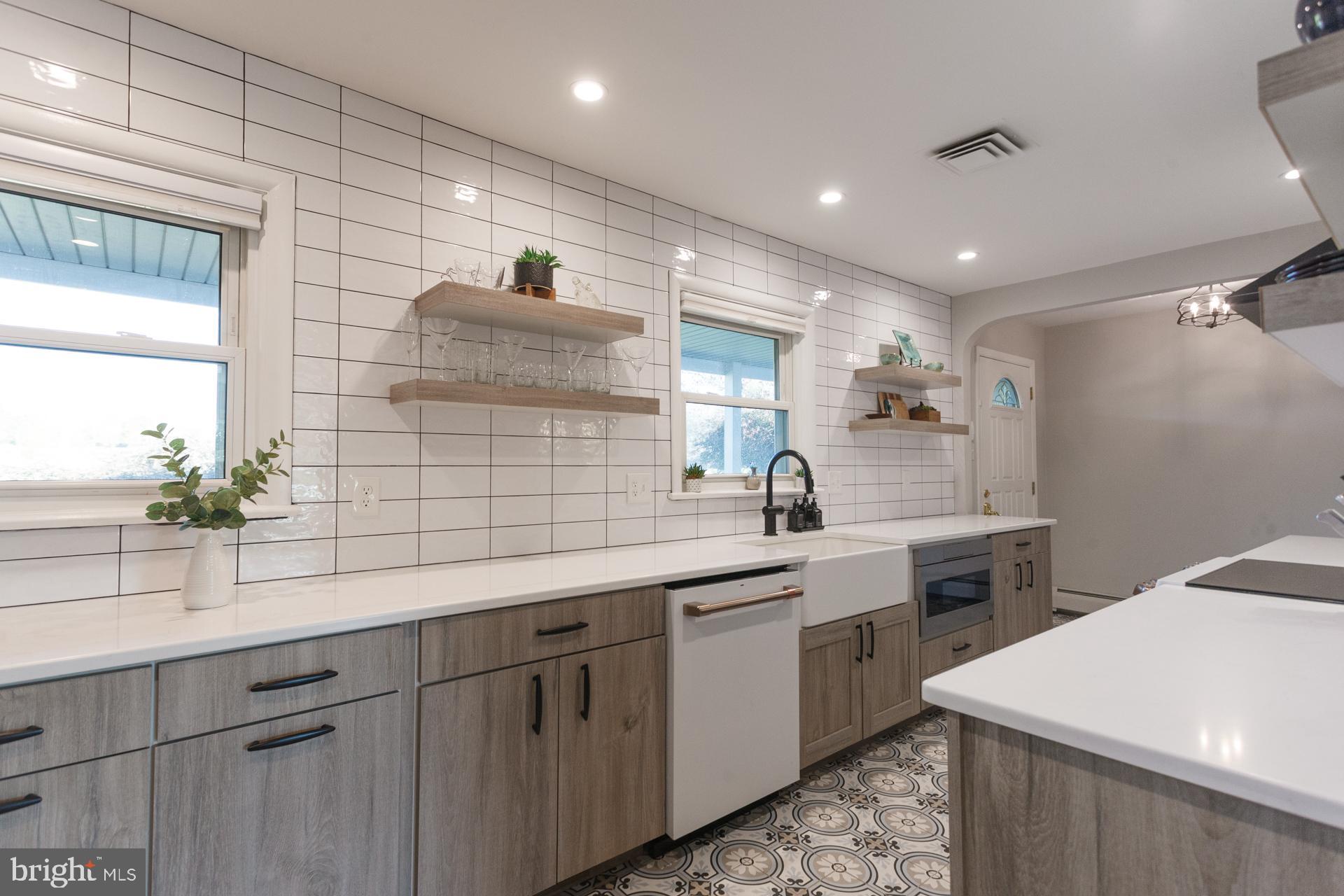 2017 Quarry Road Yardley, PA 19067 - Photo 2 of 37 a kitchen with a sink and cabinets