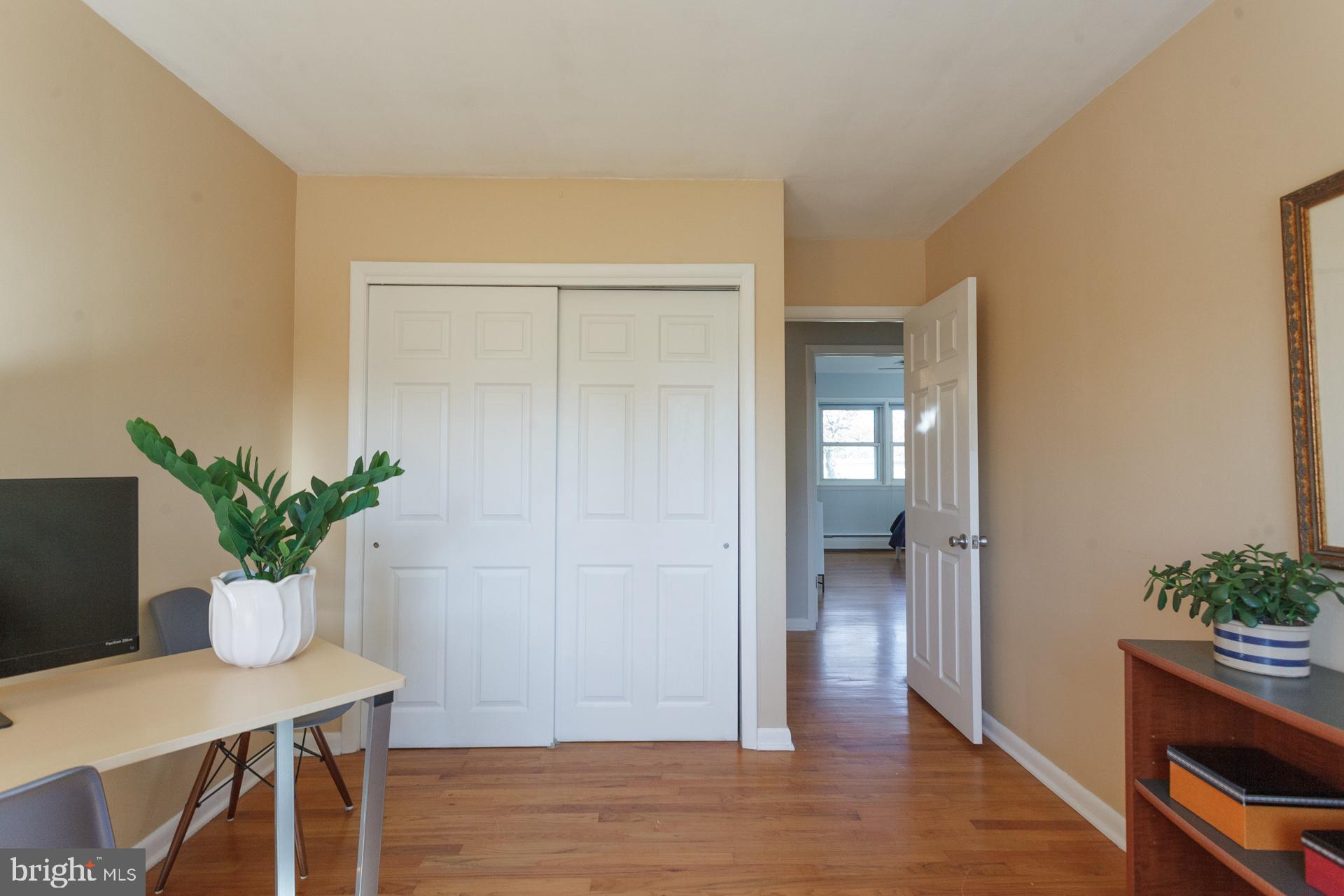 2017 Quarry Road Yardley, PA 19067 - Photo 21 of 37 a view of a dining room with furniture and wooden floor