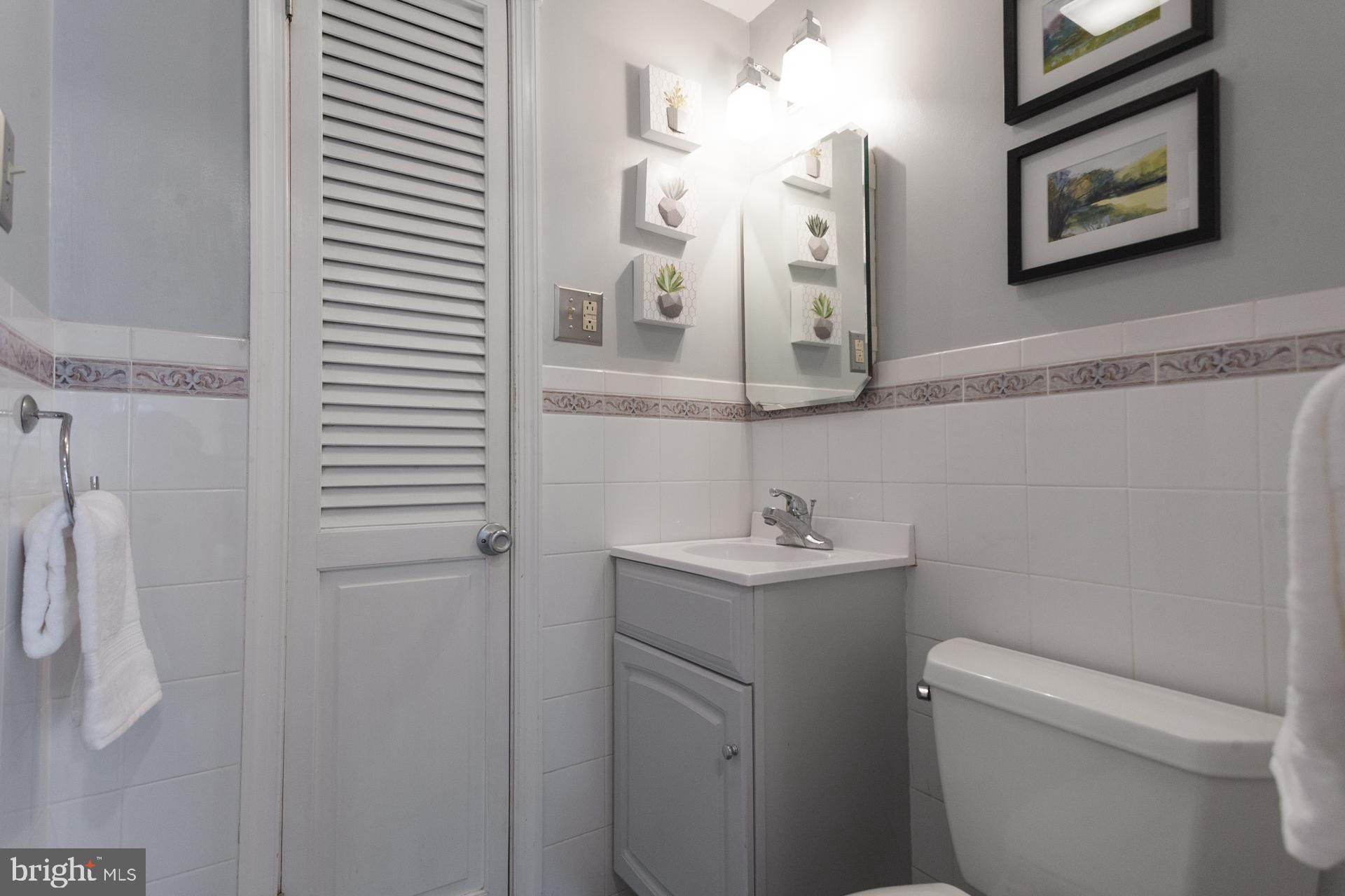 2017 Quarry Road Yardley, PA 19067 - Photo 22 of 37 a bathroom with a toilet sink and mirror