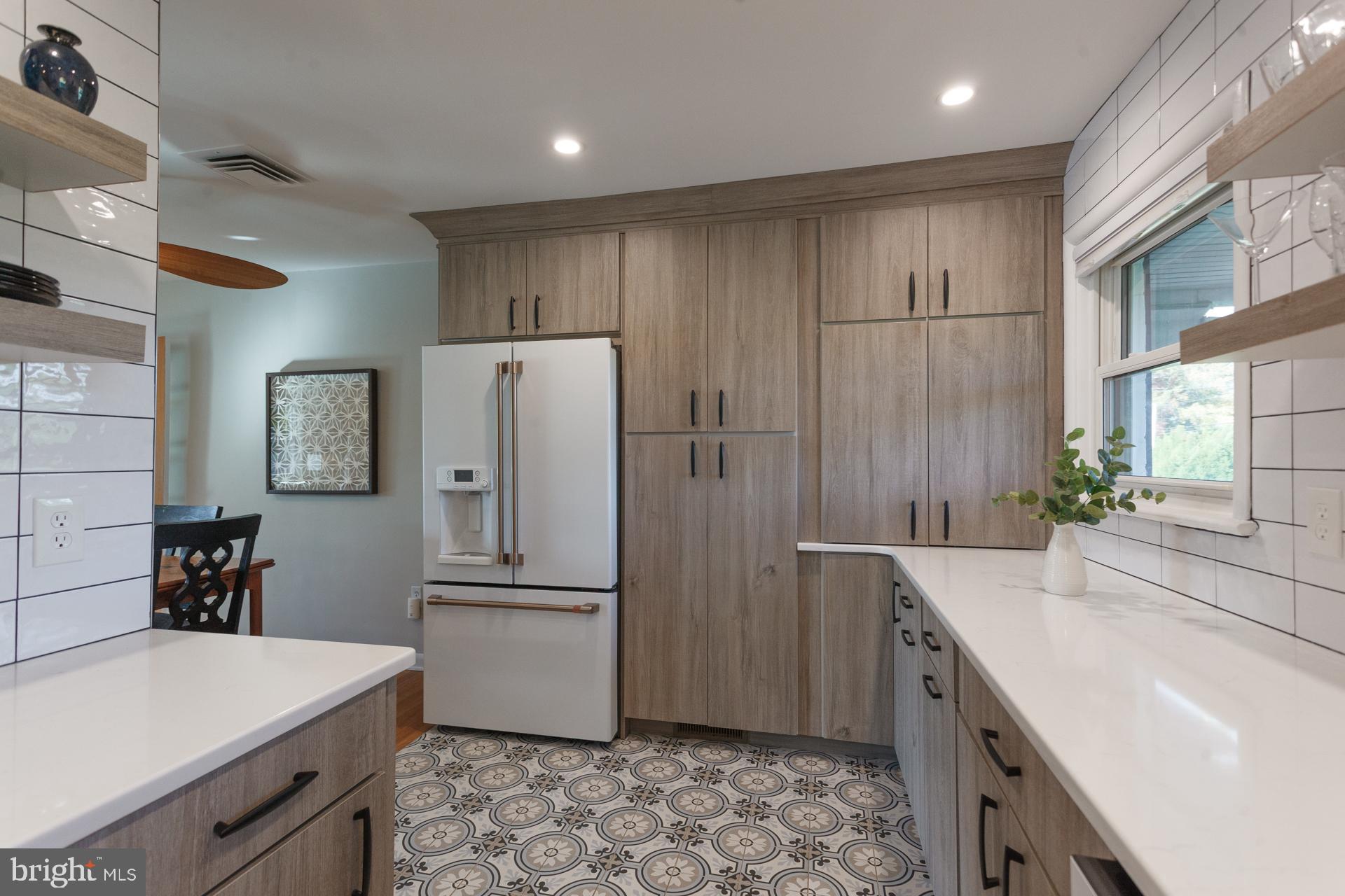 2017 Quarry Road Yardley, PA 19067 - Photo 3 of 37 a kitchen with granite countertop a refrigerator and a sink
